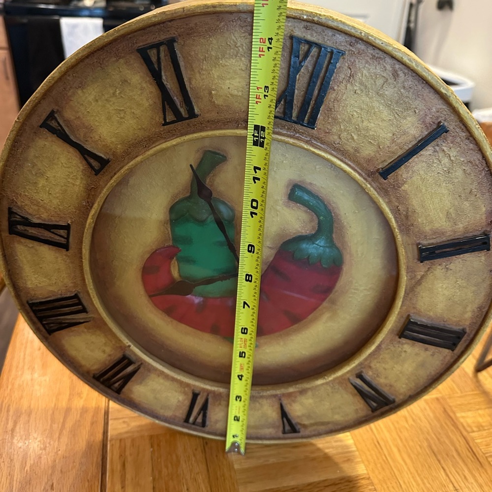 15” tall. WOODEN COLONIAL THEMED ELECTRIC CLOCK JALAPEÑOS